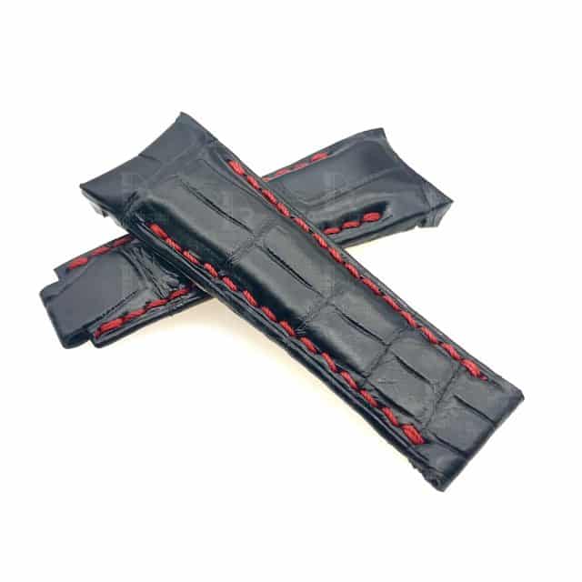 Genuine black Belly-scale leather material with red stitching